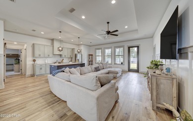This beautifully crafted 5-bedroom, 2-bathroom home offers on Nature Walk Golf Course in Florida - for sale on GolfHomes.com, golf home, golf lot