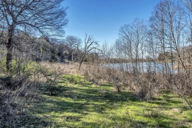 This unique waterfront property in the Lake Ridge community of on Tangle Ridge Golf Club in Texas - for sale on GolfHomes.com, golf home, golf lot