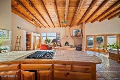 One of a kind Eddie Chavez home featuring original Pueblo style on New Mexico St Univ Golf Course in New Mexico - for sale on GolfHomes.com, golf home, golf lot