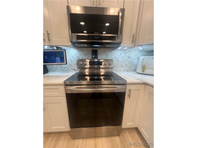 Beautiful THREE or FOUR bedroom home in desirable Connell Lake on LakeSide Country Club in Florida - for sale on GolfHomes.com, golf home, golf lot