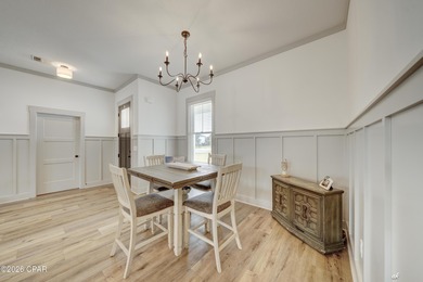 This beautifully crafted 5-bedroom, 2-bathroom home offers on Nature Walk Golf Course in Florida - for sale on GolfHomes.com, golf home, golf lot