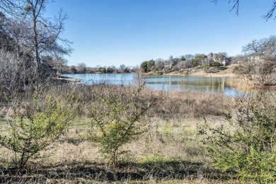 This unique waterfront property in the Lake Ridge community of on Tangle Ridge Golf Club in Texas - for sale on GolfHomes.com, golf home, golf lot