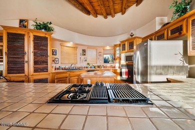 One of a kind Eddie Chavez home featuring original Pueblo style on New Mexico St Univ Golf Course in New Mexico - for sale on GolfHomes.com, golf home, golf lot