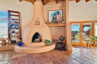 One of a kind Eddie Chavez home featuring original Pueblo style on New Mexico St Univ Golf Course in New Mexico - for sale on GolfHomes.com, golf home, golf lot