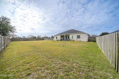 This beautifully crafted 5-bedroom, 2-bathroom home offers on Nature Walk Golf Course in Florida - for sale on GolfHomes.com, golf home, golf lot