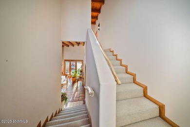 One of a kind Eddie Chavez home featuring original Pueblo style on New Mexico St Univ Golf Course in New Mexico - for sale on GolfHomes.com, golf home, golf lot