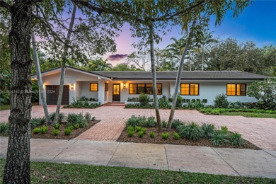 Stunning home located on a spacious lot boasting views of the on Biltmore Golf Course in Florida - for sale on GolfHomes.com, golf home, golf lot
