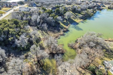 This unique waterfront property in the Lake Ridge community of on Tangle Ridge Golf Club in Texas - for sale on GolfHomes.com, golf home, golf lot