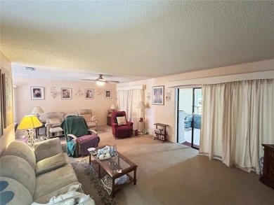 Located on a cul-de-sac, this 2 bedroom home overlooks a on Cypresswood Golf and Country Club in Florida - for sale on GolfHomes.com, golf home, golf lot