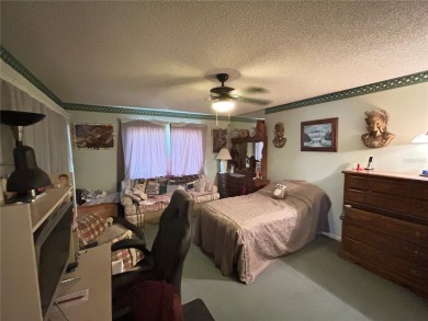 Located on a cul-de-sac, this 2 bedroom home overlooks a on Cypresswood Golf and Country Club in Florida - for sale on GolfHomes.com, golf home, golf lot
