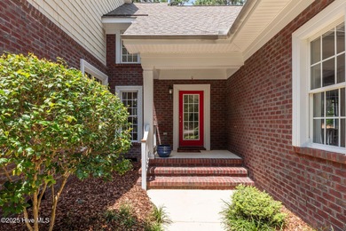 GORGEOUS, GOLF FRONT LIVING IN PINEWILD! Perfectly positioned on on Pinewild Country Club of Pinehurst in North Carolina - for sale on GolfHomes.com, golf home, golf lot