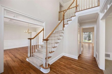 Tucked away on a quiet, double cul-de-sac street in Brookstone on Brookstone Golf and Country Club in Georgia - for sale on GolfHomes.com, golf home, golf lot