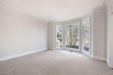 Tucked away on a quiet, double cul-de-sac street in Brookstone on Brookstone Golf and Country Club in Georgia - for sale on GolfHomes.com, golf home, golf lot