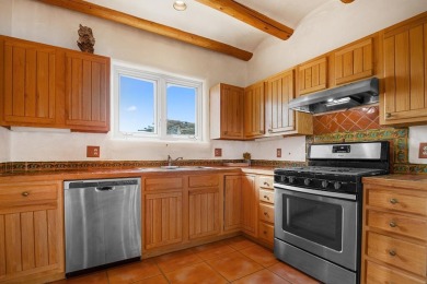 Authentic Adobe - Experience the charm and craftsmanship of true on Taos Country Club in New Mexico - for sale on GolfHomes.com, golf home, golf lot