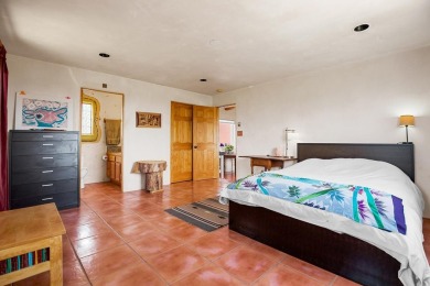 Authentic Adobe - Experience the charm and craftsmanship of true on Taos Country Club in New Mexico - for sale on GolfHomes.com, golf home, golf lot