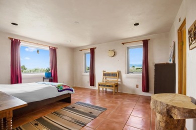 Authentic Adobe - Experience the charm and craftsmanship of true on Taos Country Club in New Mexico - for sale on GolfHomes.com, golf home, golf lot