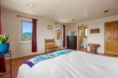 Authentic Adobe - Experience the charm and craftsmanship of true on Taos Country Club in New Mexico - for sale on GolfHomes.com, golf home, golf lot