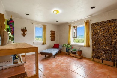Authentic Adobe - Experience the charm and craftsmanship of true on Taos Country Club in New Mexico - for sale on GolfHomes.com, golf home, golf lot