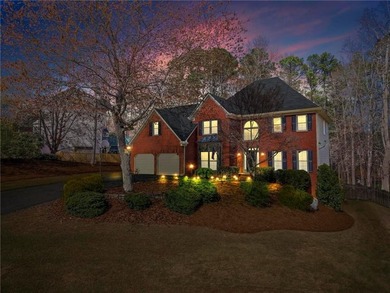Welcome home to this timeless brick traditional nestled at the on Brookstone Golf and Country Club in Georgia - for sale on GolfHomes.com, golf home, golf lot