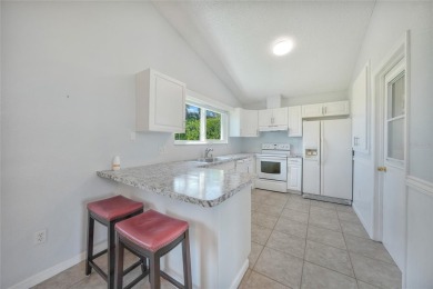 Move-in ready 3-bedroom, 2-bathroom single-family home with on Duffys Golf Center in Florida - for sale on GolfHomes.com, golf home, golf lot