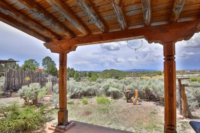 Authentic Adobe - Experience the charm and craftsmanship of true on Taos Country Club in New Mexico - for sale on GolfHomes.com, golf home, golf lot