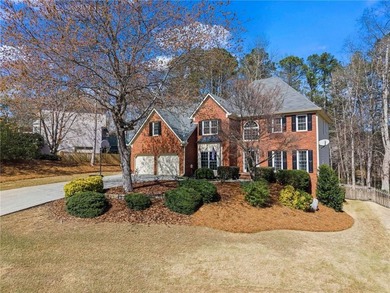 Welcome home to this timeless brick traditional nestled at the on Brookstone Golf and Country Club in Georgia - for sale on GolfHomes.com, golf home, golf lot