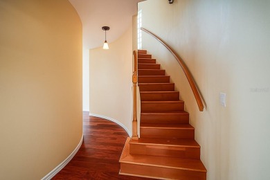 One or more photo(s) has been virtually staged. Nestled on a on Eastwood Golf Club in Florida - for sale on GolfHomes.com, golf home, golf lot