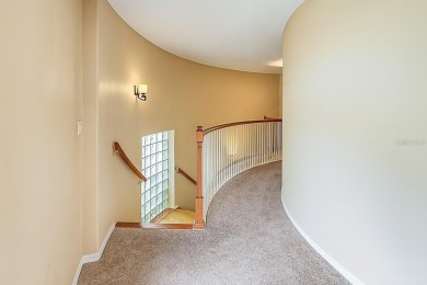 One or more photo(s) has been virtually staged. Nestled on a on Eastwood Golf Club in Florida - for sale on GolfHomes.com, golf home, golf lot