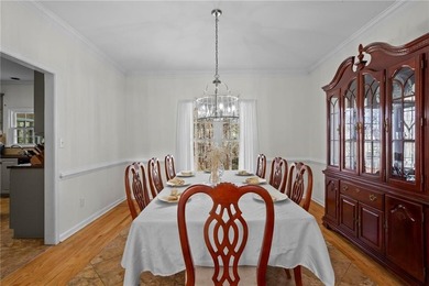 Welcome home to this timeless brick traditional nestled at the on Brookstone Golf and Country Club in Georgia - for sale on GolfHomes.com, golf home, golf lot