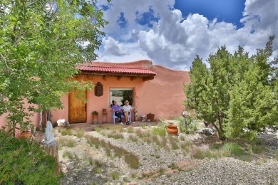 Authentic Adobe - Experience the charm and craftsmanship of true on Taos Country Club in New Mexico - for sale on GolfHomes.com, golf home, golf lot