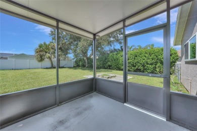 Move-in ready 3-bedroom, 2-bathroom single-family home with on Duffys Golf Center in Florida - for sale on GolfHomes.com, golf home, golf lot