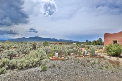 Authentic Adobe - Experience the charm and craftsmanship of true on Taos Country Club in New Mexico - for sale on GolfHomes.com, golf home, golf lot