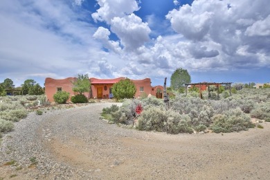 Authentic Adobe - Experience the charm and craftsmanship of true on Taos Country Club in New Mexico - for sale on GolfHomes.com, golf home, golf lot