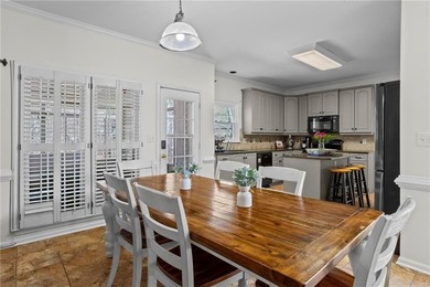 Welcome home to this timeless brick traditional nestled at the on Brookstone Golf and Country Club in Georgia - for sale on GolfHomes.com, golf home, golf lot