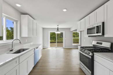 Introducing The Ponds at Gateway, where luxurious living meets on Gateway Golf Club in Michigan - for sale on GolfHomes.com, golf home, golf lot