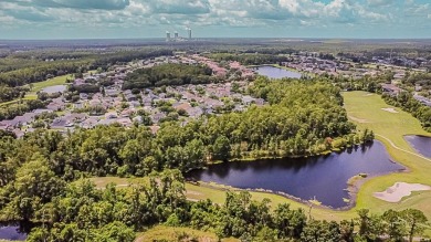 One or more photo(s) has been virtually staged. Nestled on a on Eastwood Golf Club in Florida - for sale on GolfHomes.com, golf home, golf lot