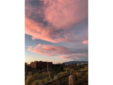 Authentic Adobe - Experience the charm and craftsmanship of true on Taos Country Club in New Mexico - for sale on GolfHomes.com, golf home, golf lot