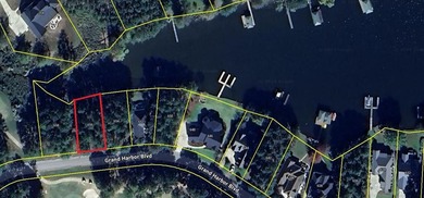Motivated seller! Build your dream home on this level wooded on The Patriot Golf Club At Grand Harbor in South Carolina - for sale on GolfHomes.com, golf home, golf lot