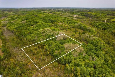 Build Your Dream Home Near Lake Michigan! This 5-acre parcel in on Antrim Dells Golf Course in Michigan - for sale on GolfHomes.com, golf home, golf lot