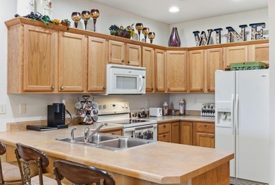 Fully furnished and ready to roll, this third-floor condo on Thousand Hills Golf Resort in Missouri - for sale on GolfHomes.com, golf home, golf lot