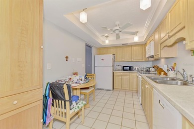 Appealing two bedroom, two bath, first floor, end unit, in the on Capri Isle Golf Club in Florida - for sale on GolfHomes.com, golf home, golf lot