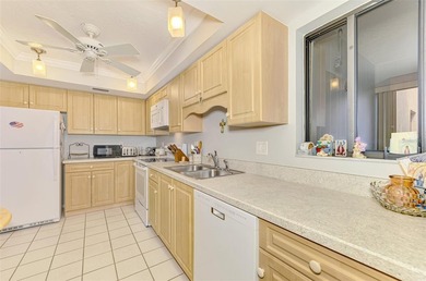 Appealing two bedroom, two bath, first floor, end unit, in the on Capri Isle Golf Club in Florida - for sale on GolfHomes.com, golf home, golf lot