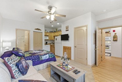 Fully furnished and ready to roll, this third-floor condo on Thousand Hills Golf Resort in Missouri - for sale on GolfHomes.com, golf home, golf lot