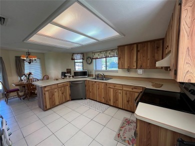 Discover comfort and convenience in this well-maintained on The Club At Pelican Bay - North Course in Florida - for sale on GolfHomes.com, golf home, golf lot