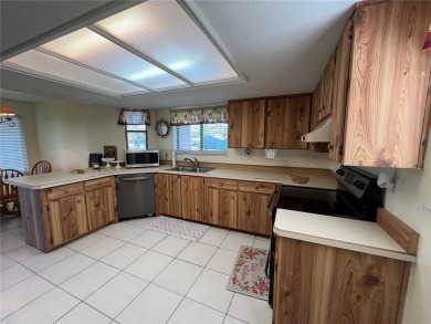 Discover comfort and convenience in this well-maintained on The Club At Pelican Bay - North Course in Florida - for sale on GolfHomes.com, golf home, golf lot
