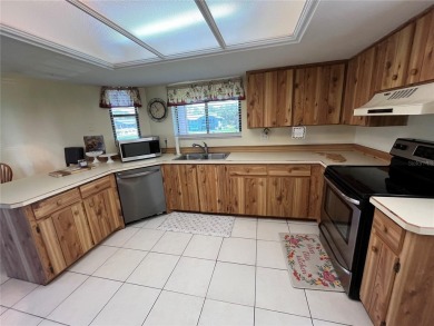 Discover comfort and convenience in this well-maintained on The Club At Pelican Bay - North Course in Florida - for sale on GolfHomes.com, golf home, golf lot