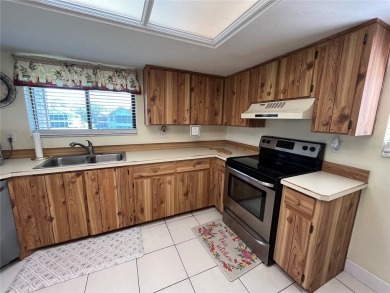 Discover comfort and convenience in this well-maintained on The Club At Pelican Bay - North Course in Florida - for sale on GolfHomes.com, golf home, golf lot