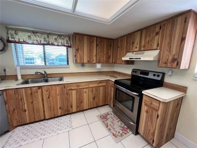 Discover comfort and convenience in this well-maintained on The Club At Pelican Bay - North Course in Florida - for sale on GolfHomes.com, golf home, golf lot
