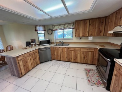 Discover comfort and convenience in this well-maintained on The Club At Pelican Bay - North Course in Florida - for sale on GolfHomes.com, golf home, golf lot