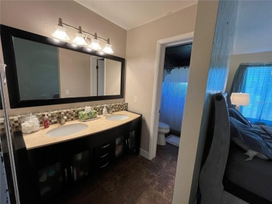 Discover comfort and convenience in this well-maintained on The Club At Pelican Bay - North Course in Florida - for sale on GolfHomes.com, golf home, golf lot
